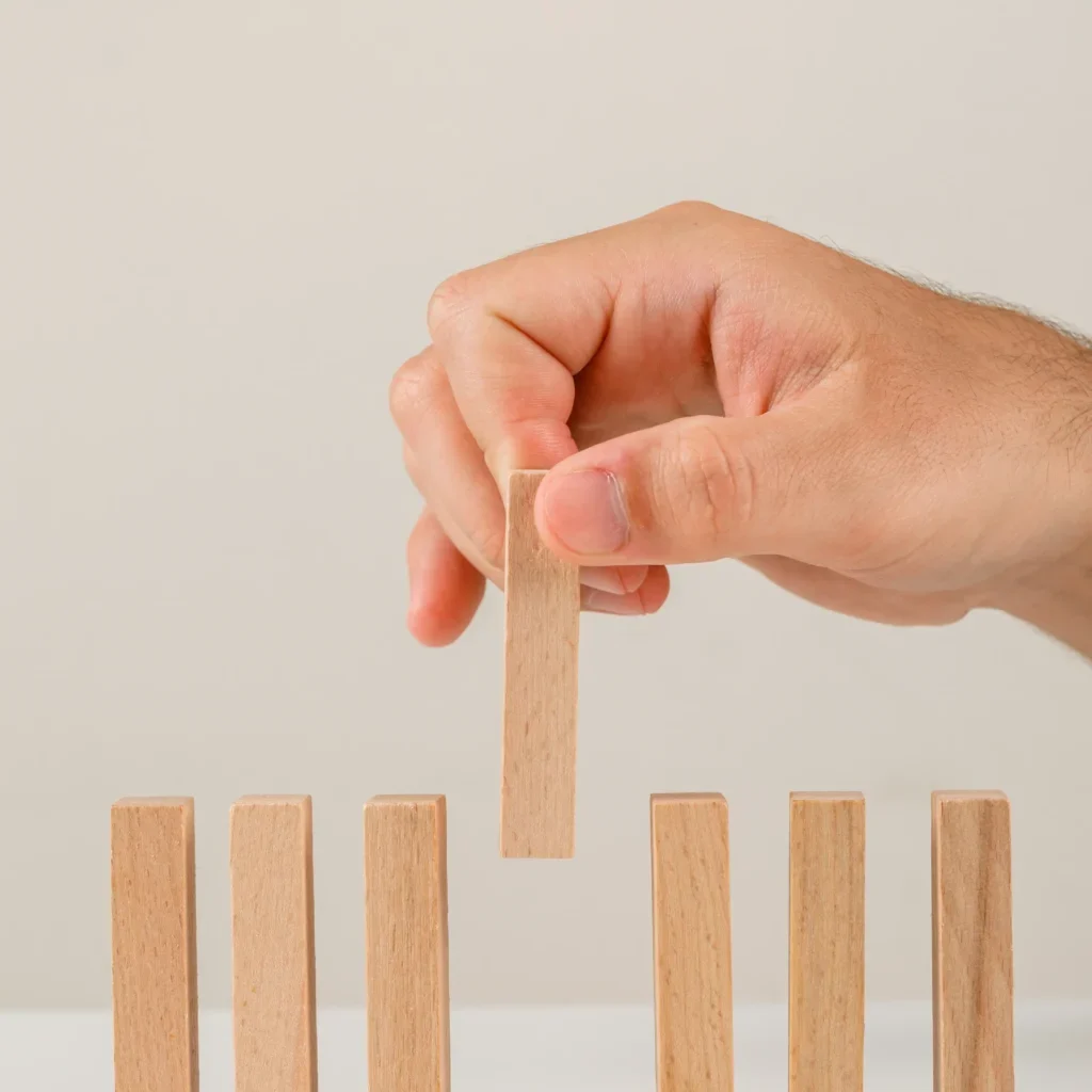 business-concept-white-backgroud-side-view-hand-placing-wooden-block-line-1024x1536